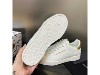 DOLCE & GABBANA WHITE AND GOLD PORTOFINO SNEAKERS